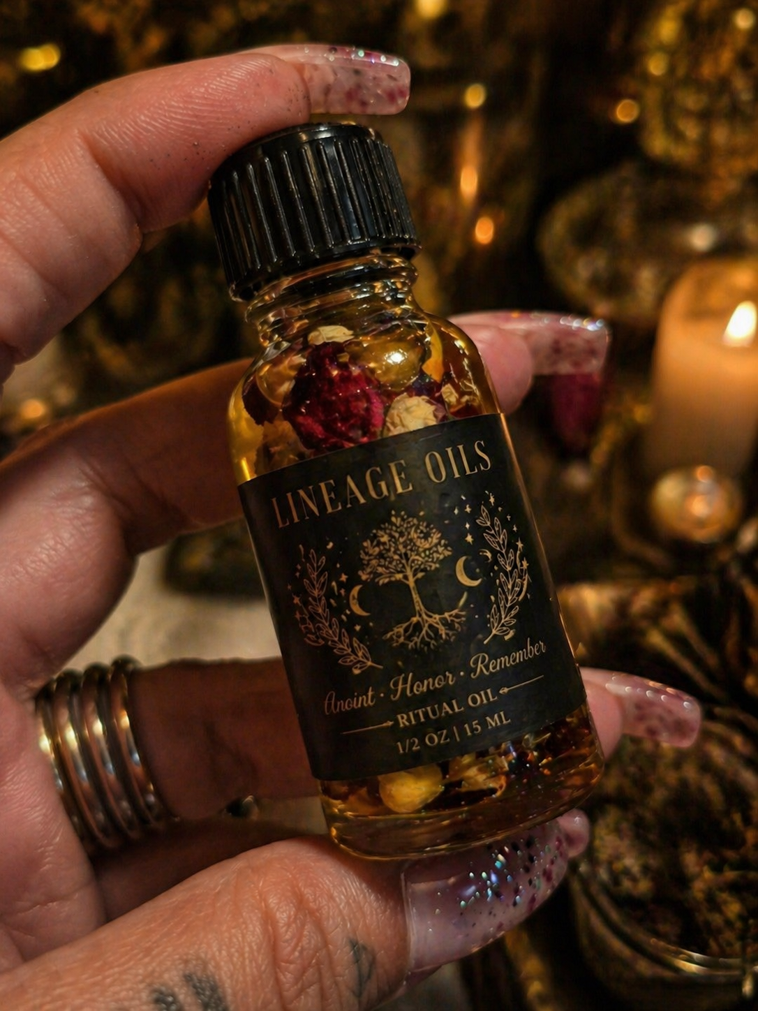 Lineage Oils — the labelled bottle of the FolkloreMagick corridor, held in Meenakshii's hand by candlelight